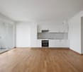 kitchen, oven, white cabinets, large windows, wooden floor, balcony