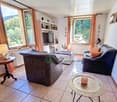 two sofas, coffee table, TV, radiator, shelves, lamp, table, tiled floor
