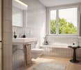 White tiled walls and floor, bathtub, toilet, sink, washing machine, window, flower vase