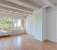 modern room, wooden floor, large windows, balcony, radiators