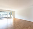 empty room, wooden floors, sliding glass doors, balcony