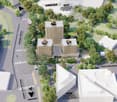 The image shows an aerial view of a complex of buildings in a city. The buildings include the UNICEF and OIT (Organisation Internationale du Travail) offices, as well as the OIM (Organisation Internationale pour l'Immigration) office. There is also an int