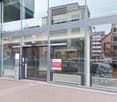 glass walls, entrance door, parking place
