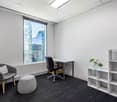 modern office interior with desk, chair, shelving, potted plants, window with blinds, carpet