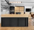 modern office, wooden desk, black metal frame, wooden floor, wooden cabinets, monitor, TV, lamps