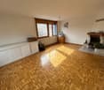 wooden parquet floor, fireplace, large window, wooden cabinet, printer, box, radiator