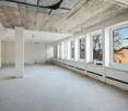 empty room, large windows, white walls, ceiling pipe, white floor