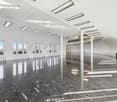 Wide room, high ceiling, white walls, marble floor, multiple large windows
