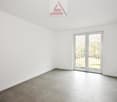 white walls, tile flooring, sliding glass doors, balcony