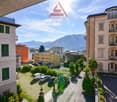 buildings, green grass, cars, mountains, terrace