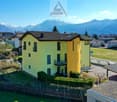 2 story house, yellow, with balcony, 2 carport, garden, mountain view