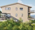 Modern 4-storey house with garage, raised ground floor, balconies, bicycle parking.