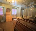 spacious room, wooden cabinets, old windows, wooden furniture, lamp