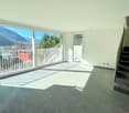 large windows, balcony, tiled floor, staircase