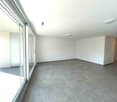 empty room, large windows, sliding glass doors, balcony, tiled floor, white walls