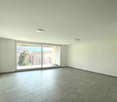 empty room, large windows, balcony, tiled floor