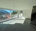 empty room, large windows, balcony, tiled floor, white walls, staircase