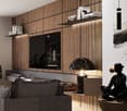 Spacious living room with wooden accent wall, large TV, modern sofa, and decorative elements such as plants and artwork