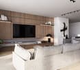 Large living room with wooden paneled walls, built-in TV entertainment unit, plush grey sectional sofa, potted plant, and track lighting.