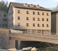 4 story building, modern design, windows with plants, bridge over river