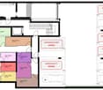 Layout of the house with 10 apartments, each with a kitchen, living room, and bathroom, with parking spaces in the basement