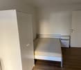 Bed, closet, nightstand