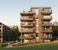 Residential building, multiple terraces, modern design, ground-level access