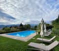 swimming pool, sun loungers, umbrellas, lawn, view of the mountains