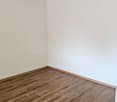 empty room, wooden floors, white walls, clean and empty space