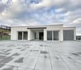 modern house, white exterior, large glass windows, open terrace, gray tiled floor