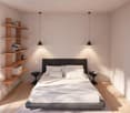 A bedroom with a bed, wooden shelves, and a glass wall