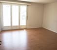 empty room, sliding doors, wooden floor, balcony