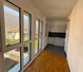 large windows, wooden floor, kitchen with dishwasher, view of mountains