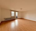empty room, wooden floors, white walls, sliding door, heater