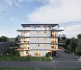 Multi-story apartment building, white exterior, balconies, underground parking, outdoor areas