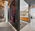 contemporary design, shower, countertop, cabinet, large mirror, wooden ceiling, trash bin