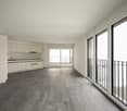 empty room, balcony, kitchen, gray floor