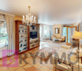 living room, beige sofa, center table, chandelier, media cabinet, TV, window, terrace, tiles