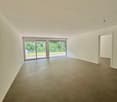 empty room, white walls, tiled floor, sliding glass doors, balcony