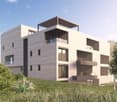 Modern architectural design, multiple floors, large windows, balconies, stone exterior, elevated position