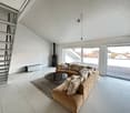 modern living room, white tiles, large windows, brown couch, glass table, fireplace
