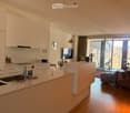 {"visible_features": ["Balcony / Terrace"], "type": "Furnished Room", "objects": ["sofa", "coffee table", "chair", "table", "kitchen island", "sink", "faucet", "faucet", "faucet", "faucet", "faucet", "faucet", "faucet", "faucet", "faucet", "faucet", "fauc