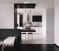 Modern open-plan living and dining area with a black sofa, coffee table, dining table with chairs, and a sleek kitchen area with cabinets, appliances, and a sink.