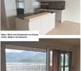 Modern kitchen with white cabinets, a central island, and a view of a lake through large windows.
