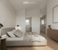 Bedroom. Modern bedroom with a grey upholstered bed, white bedding, nightstand with a table lamp, floor lamp, wooden drawer unit, and a large abstract picture on the wall.