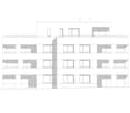 Floor plan of a multi-story building with multiple rooms and windows, including a rooftop terrace.