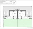 Ground floor plan of a two-family house with two apartments, each featuring living rooms, bedrooms, bathrooms, and entrances. Includes parking spaces, patios, and outdoor areas.
