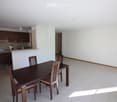 dining table with 4 chairs, open space kitchen, white tiles