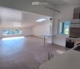 kitchen, empty, hardwood floor, modern appliances, skylight, table, windows