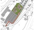 Multiple buildings with specified house numbers, roads and pathways marked, parking lots indicated, a central area for common facilities